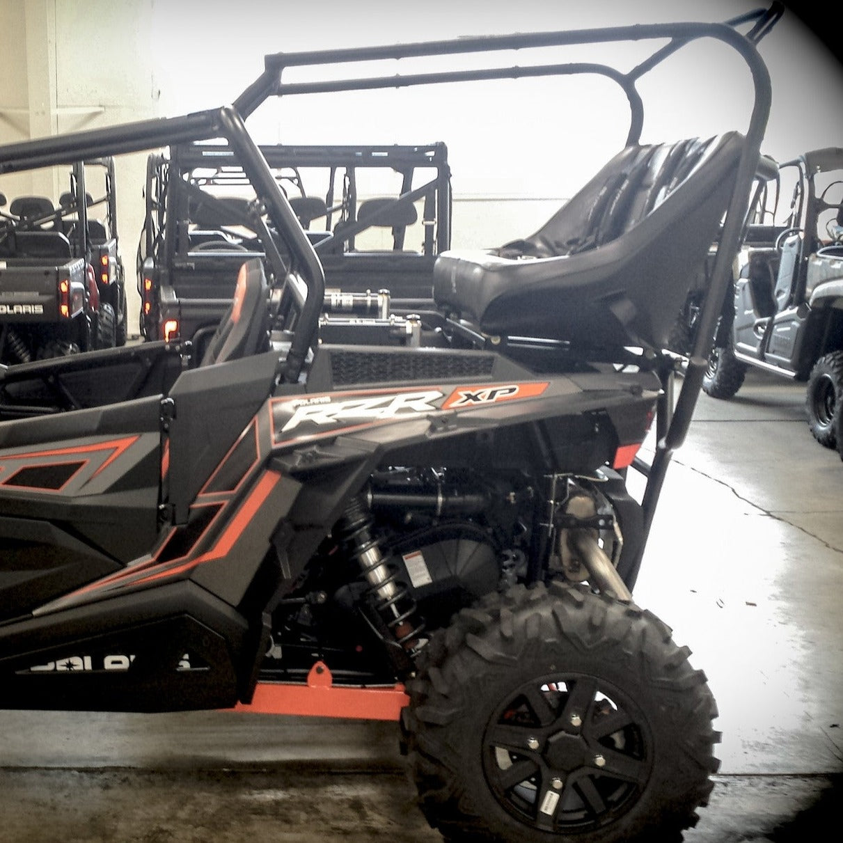 Photo of RZR 1000 Backseat and Roll Cage Kit (2014-2023) by UTV Mountain Accessories - Premium Roll Cages for UTVs / Side by Sides