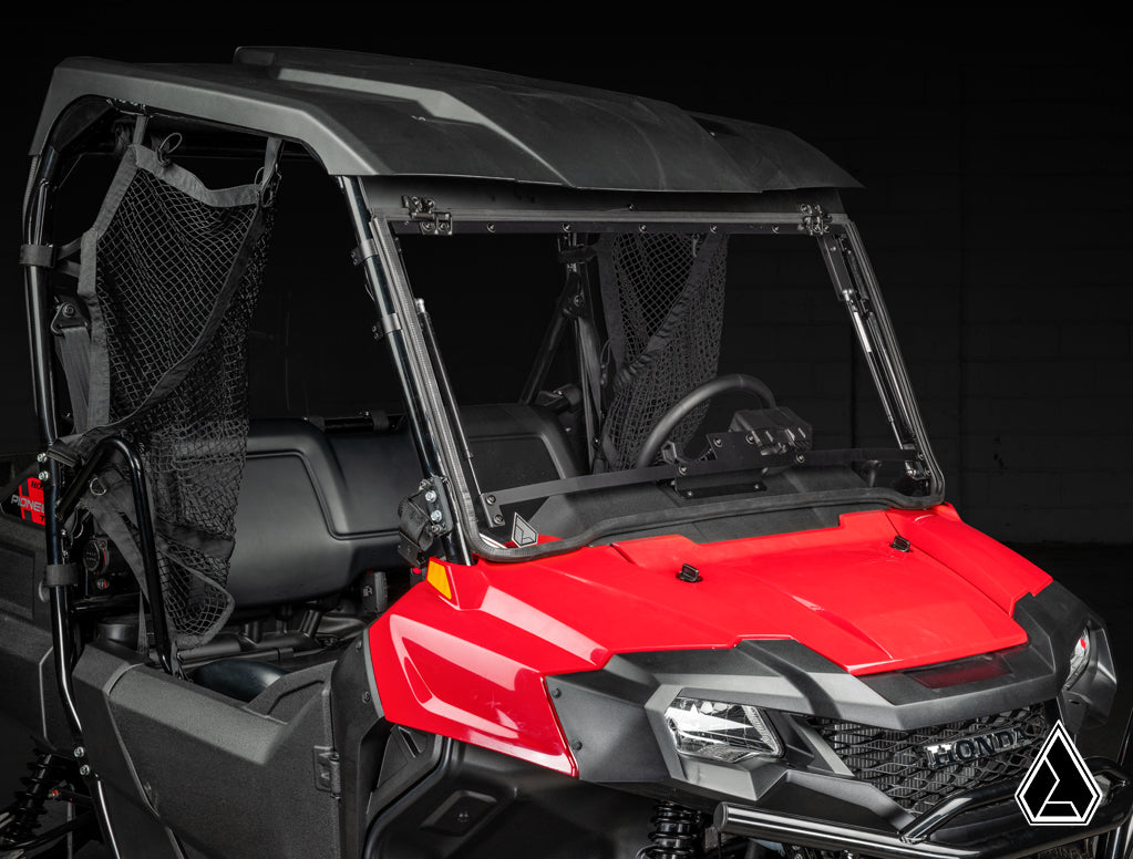 Honda Pioneer 700 Flip Windshield three-quarter view with windshield open — Assault Industries