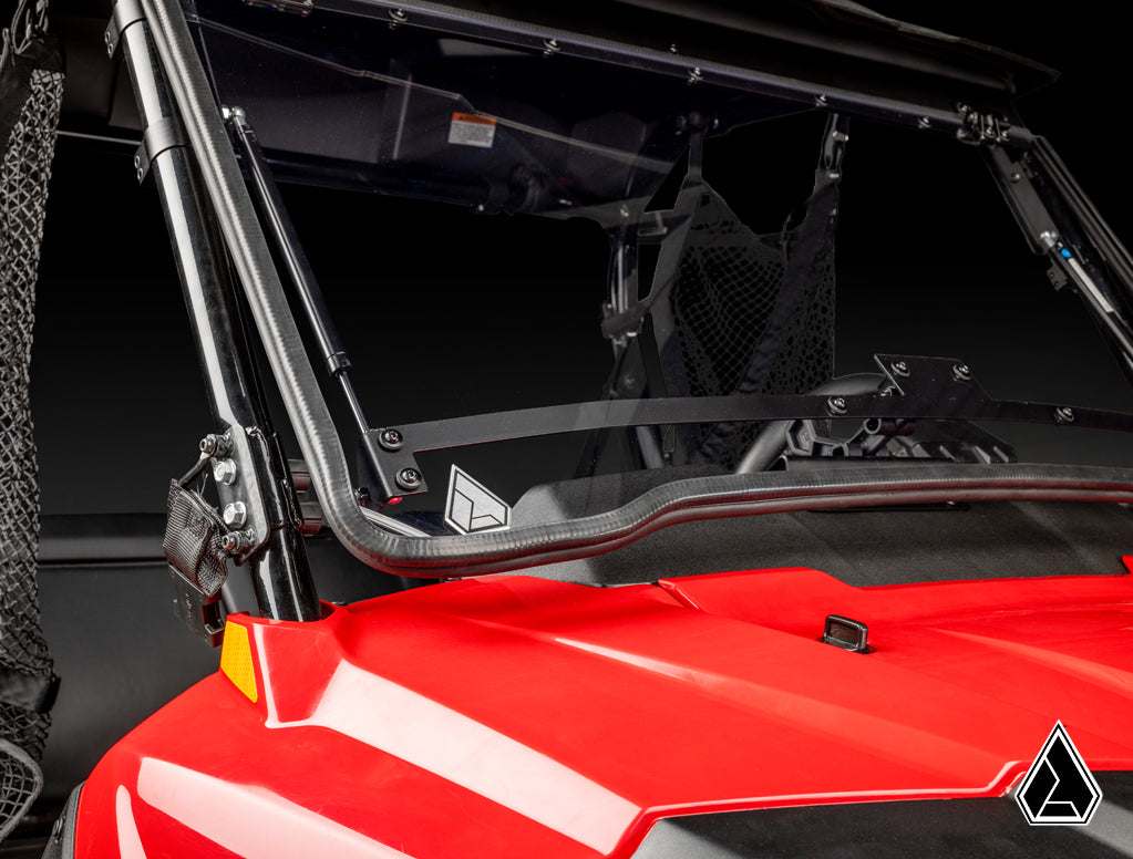 Honda Pioneer 700 Flip Windshield driver-side seal and clamp detail — Assault Industries