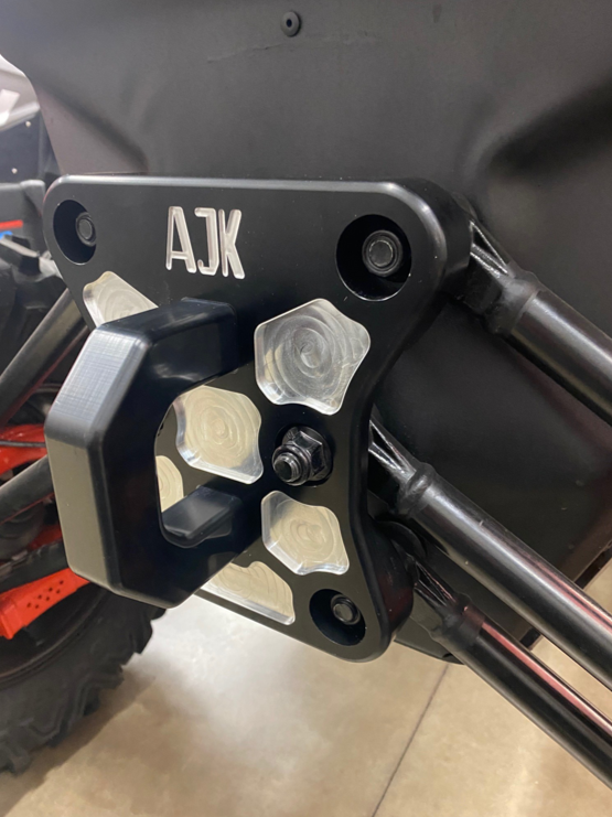 Photo of Can-Am X3 Billet Aluminum Radius Rod Plate by AJK Offroad - Premium for UTVs / Side by Sides