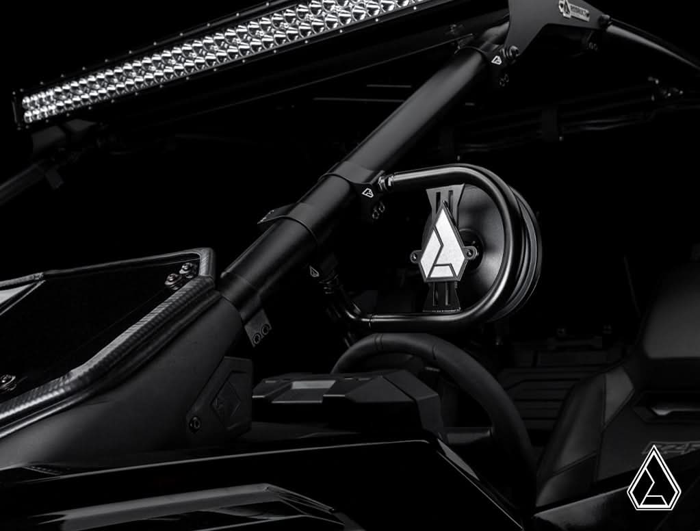 Assault Insurgent mirror mounted below a UTV roof light bar