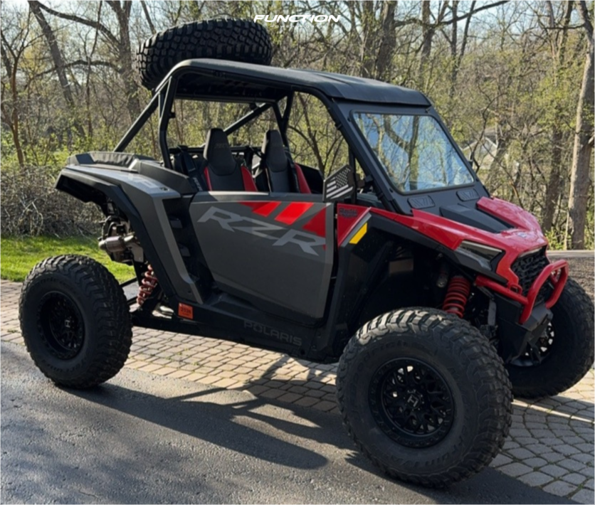 Hostile H133 Glamis wheels installed on a red 2024 Polaris RZR XP 1000 Ultimate, front three-quarter view. Owner build via Function Powersports.