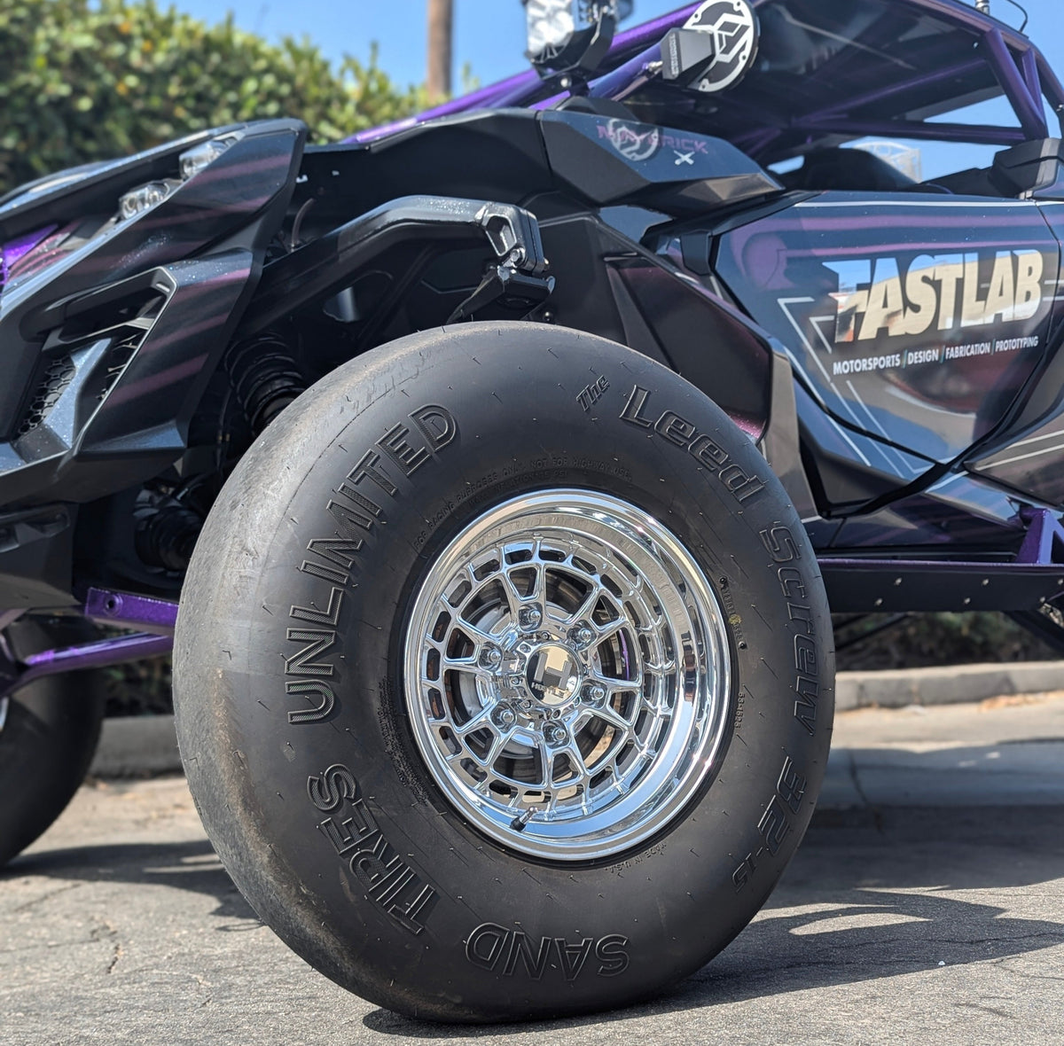 Hostile HF22 Rival polished wheel installed on a purple Can-Am Maverick R build. Photo via Fastlab.