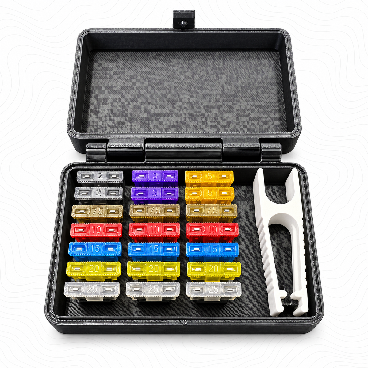 Open R1 fuse kit showing assorted blade fuses and fuse puller
