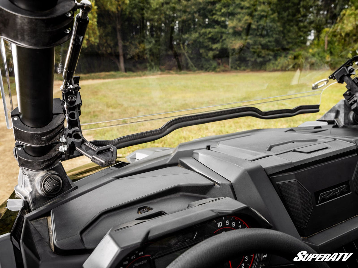 SuperATV 2020–2024 RZR Pro XP flip windshield latch, gas strut and lower seal detail