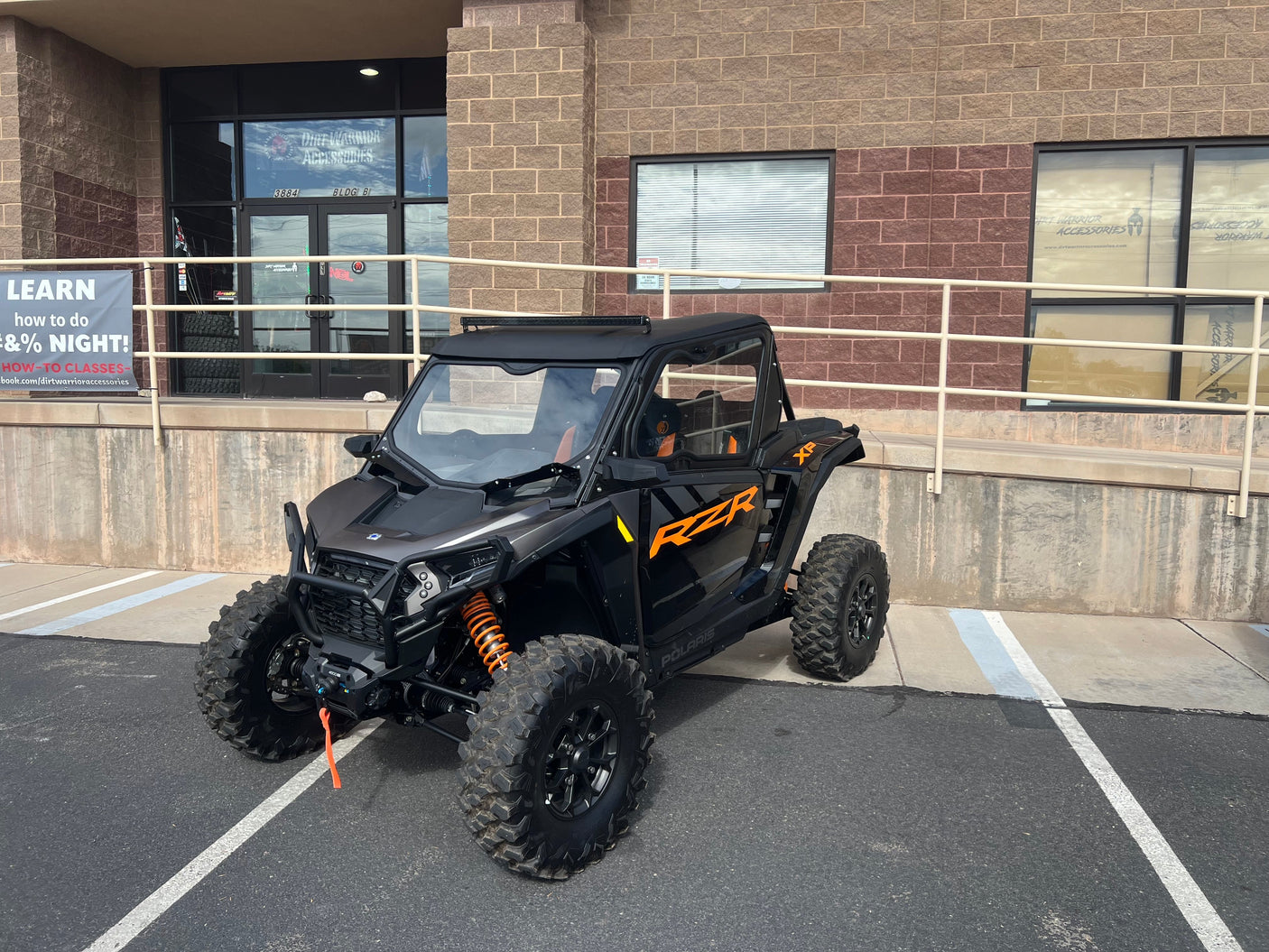 Photo of Polaris RZR 1000XP 2024 2-Seat Cab Enclosure - THE VAULT All-Weather Protection by DWA - Premium Cab Enclosures for UTVs / Side by Sides