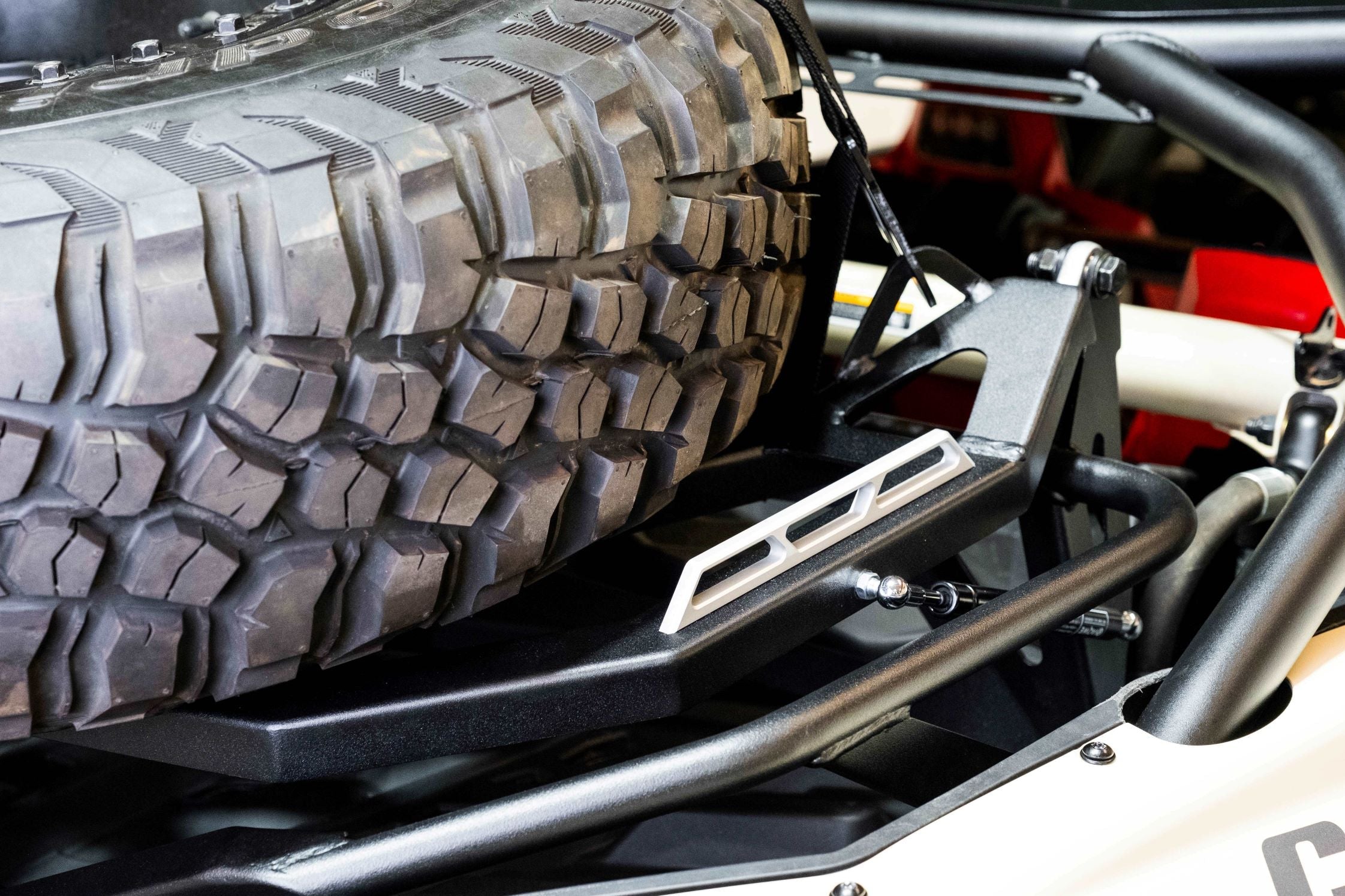 Photo of 2017-2024 Can Am X3 Maverick Volt Series Baja Spare Tire Rack by Elektric Offroad - Premium 2017+ Can Am X3 Maverick Volt Baja Rack for UTVs / Side by Sides