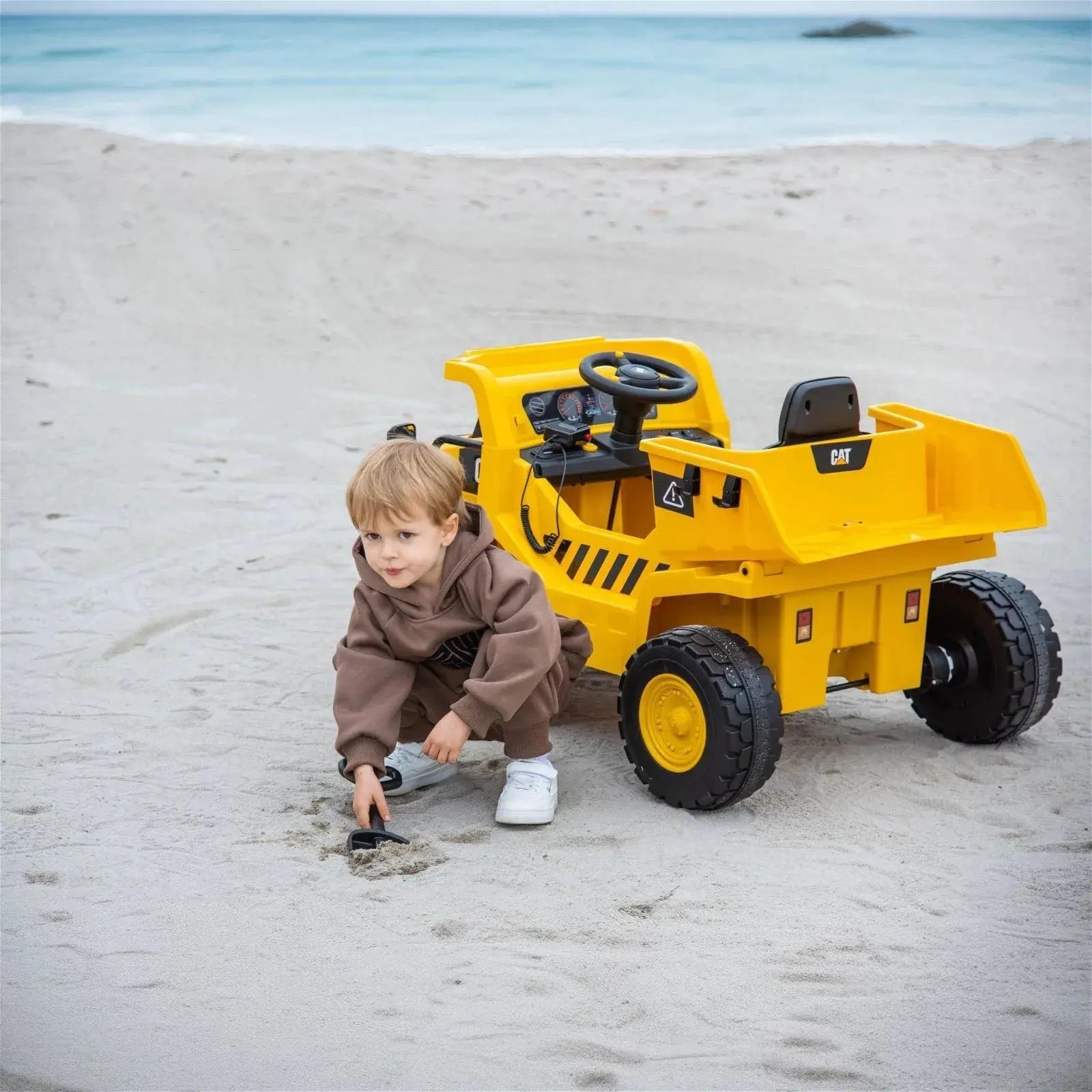 Photo of 12V CAT Electric Dump Truck 1 Seater Ride-On by Freddo Toys - Premium Electric Kids Cars for UTVs / Side by Sides