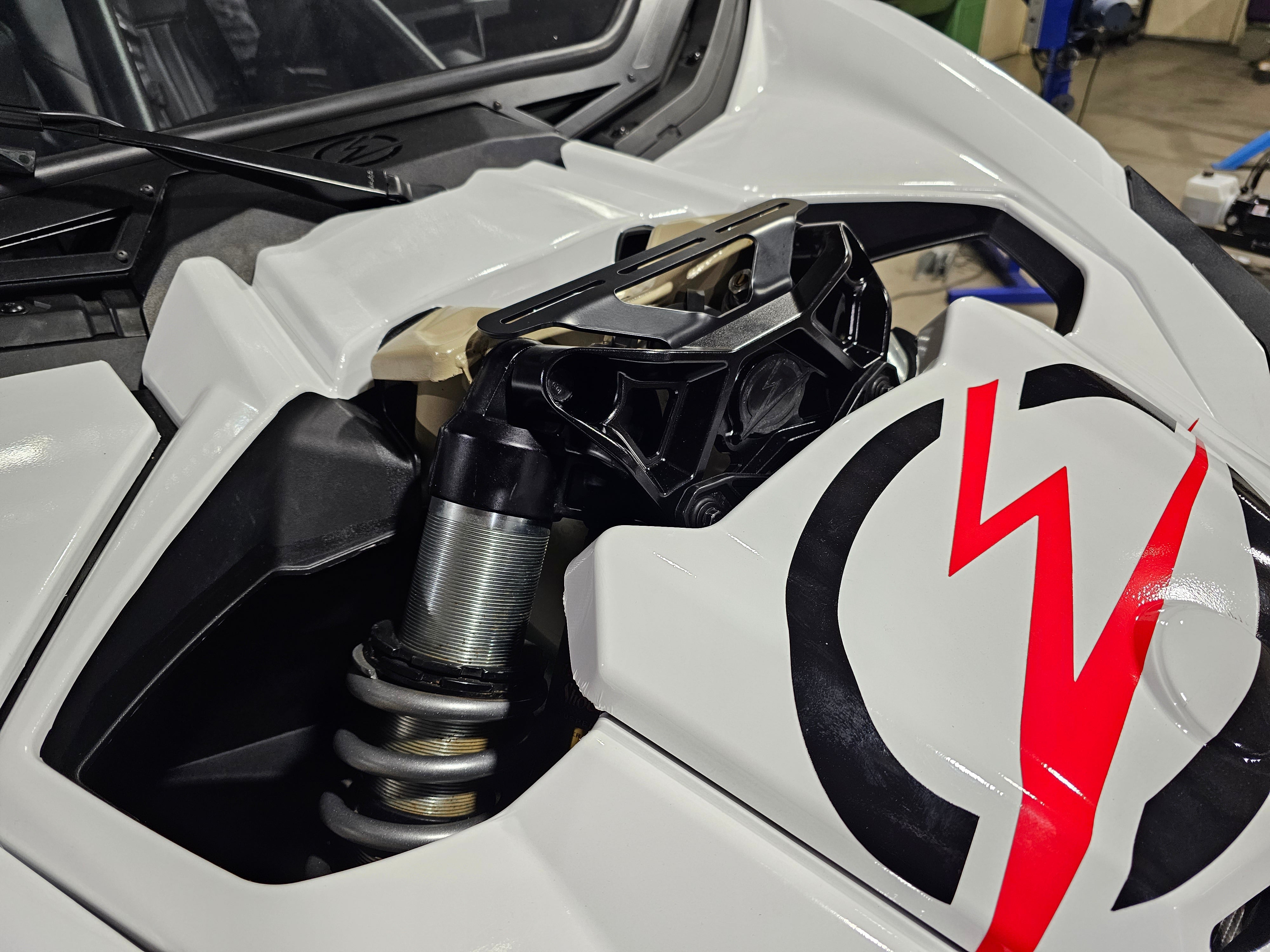 Photo of EOD 2017 to Current Can Am X3 Maverick Upper Shock Mount Brace with adjustable light mount bracket with Gun Metal finish by Elektric Offroad - Premium Shocks, Springs, & Accessories for UTVs / Side by Sides