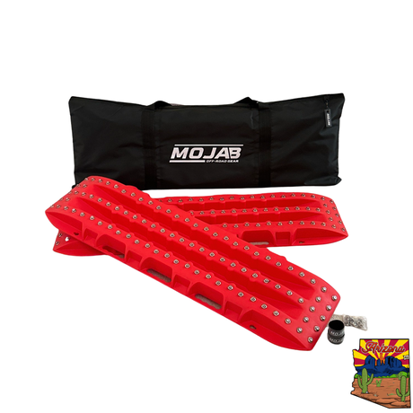 Ultimate Traction recovery board with steel plugs and storage bag.