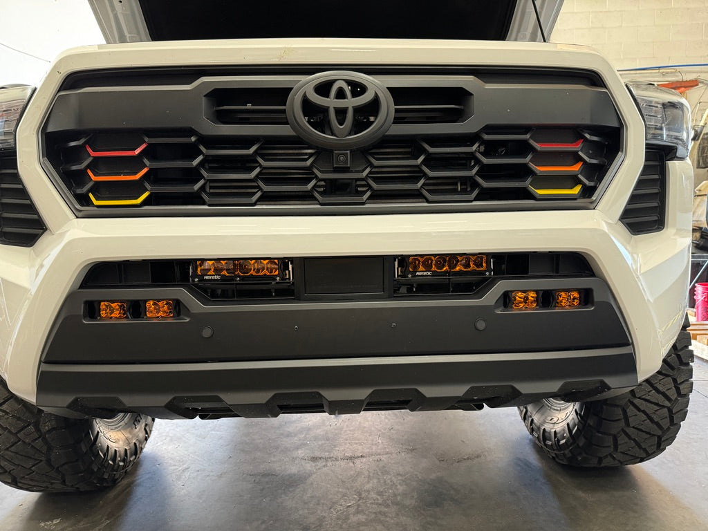 Photo of 4th Gen Tacoma Behind the Grill Dual 6" Bar Kit - Amber Lens by Heretic Studio Dealer Portal - Premium Light Bar for UTVs / Side by Sides