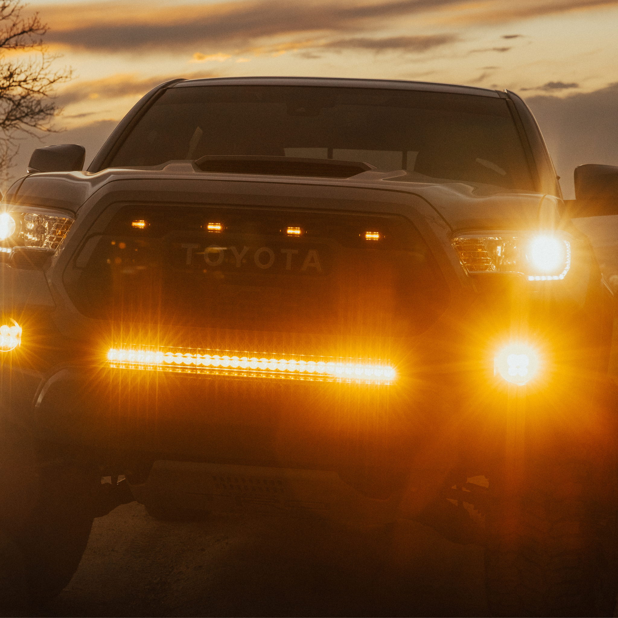 Photo of Toyota Tacoma - Behind The Grille - 30 Inch Light Bar - Amber Lens by Heretic Studio Dealer Portal - Premium for UTVs / Side by Sides