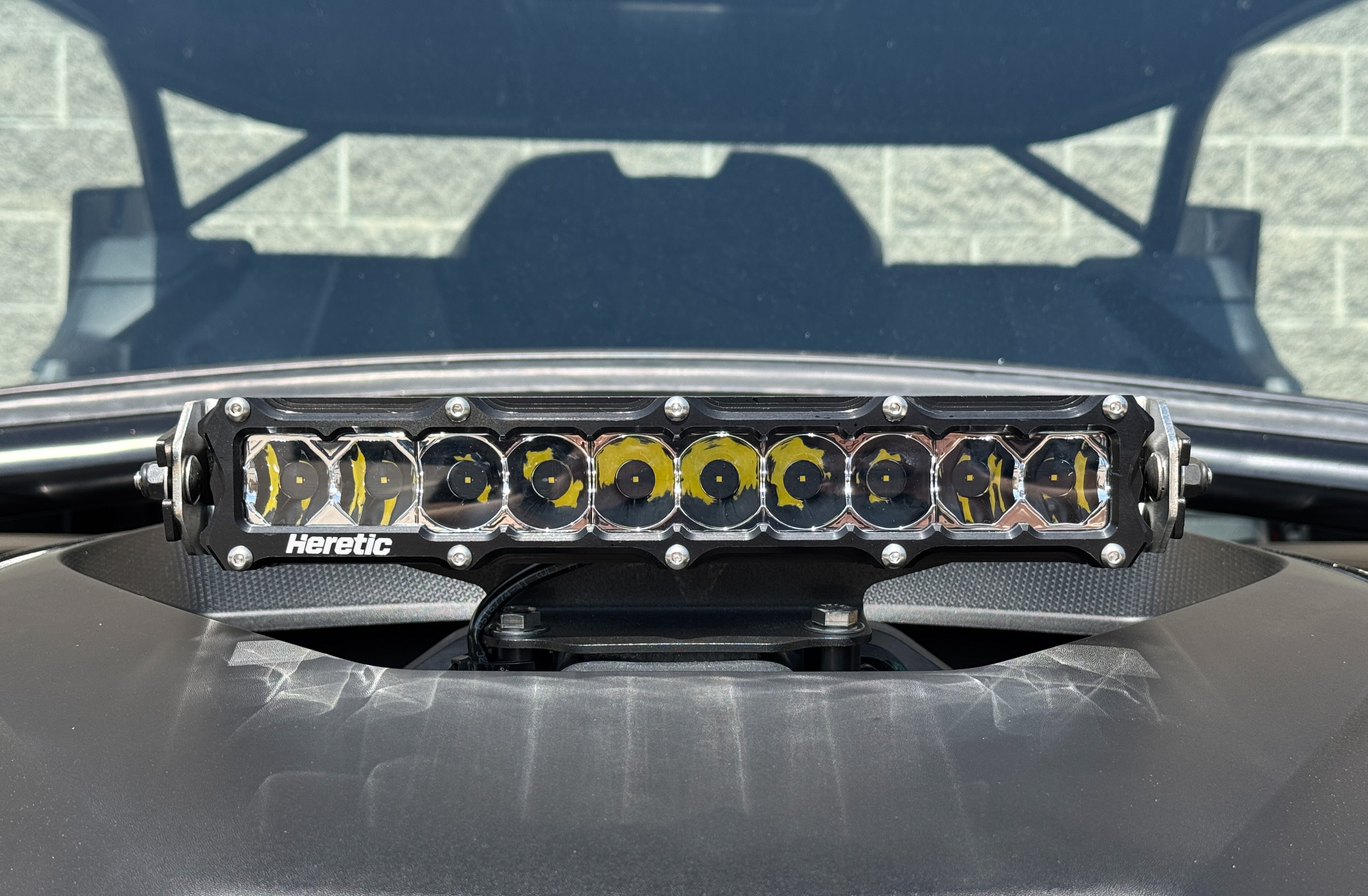 Photo of Can Am Maverick R 10 Inch Shock Tower LED Light Bar by Heretic Studio Dealer Portal - Premium UTV Headlights for UTVs / Side by Sides