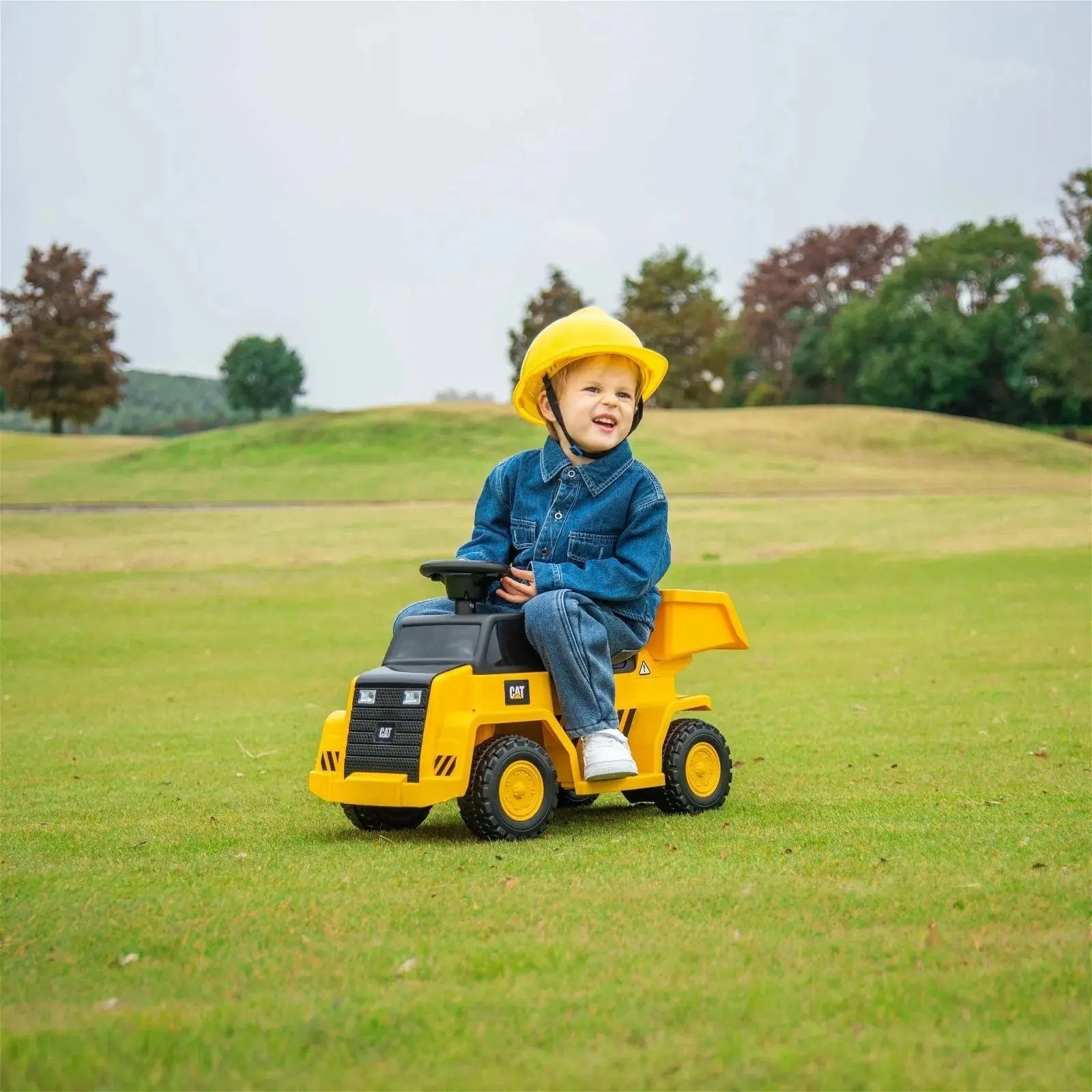 Photo of CAT Dump Truck 6V Ride-On Toy by Freddo Toys - Premium Electric Kids Cars for UTVs / Side by Sides