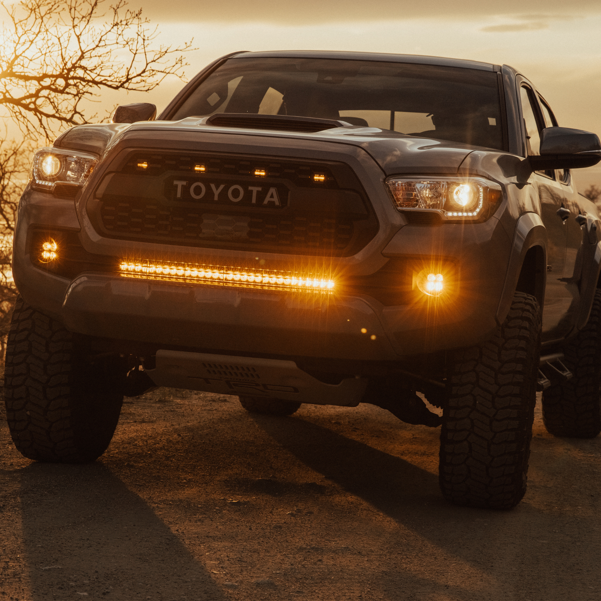 Photo of Toyota Tacoma - Behind The Grille - 30 Inch Light Bar - Amber Lens by Heretic Studio Dealer Portal - Premium for UTVs / Side by Sides