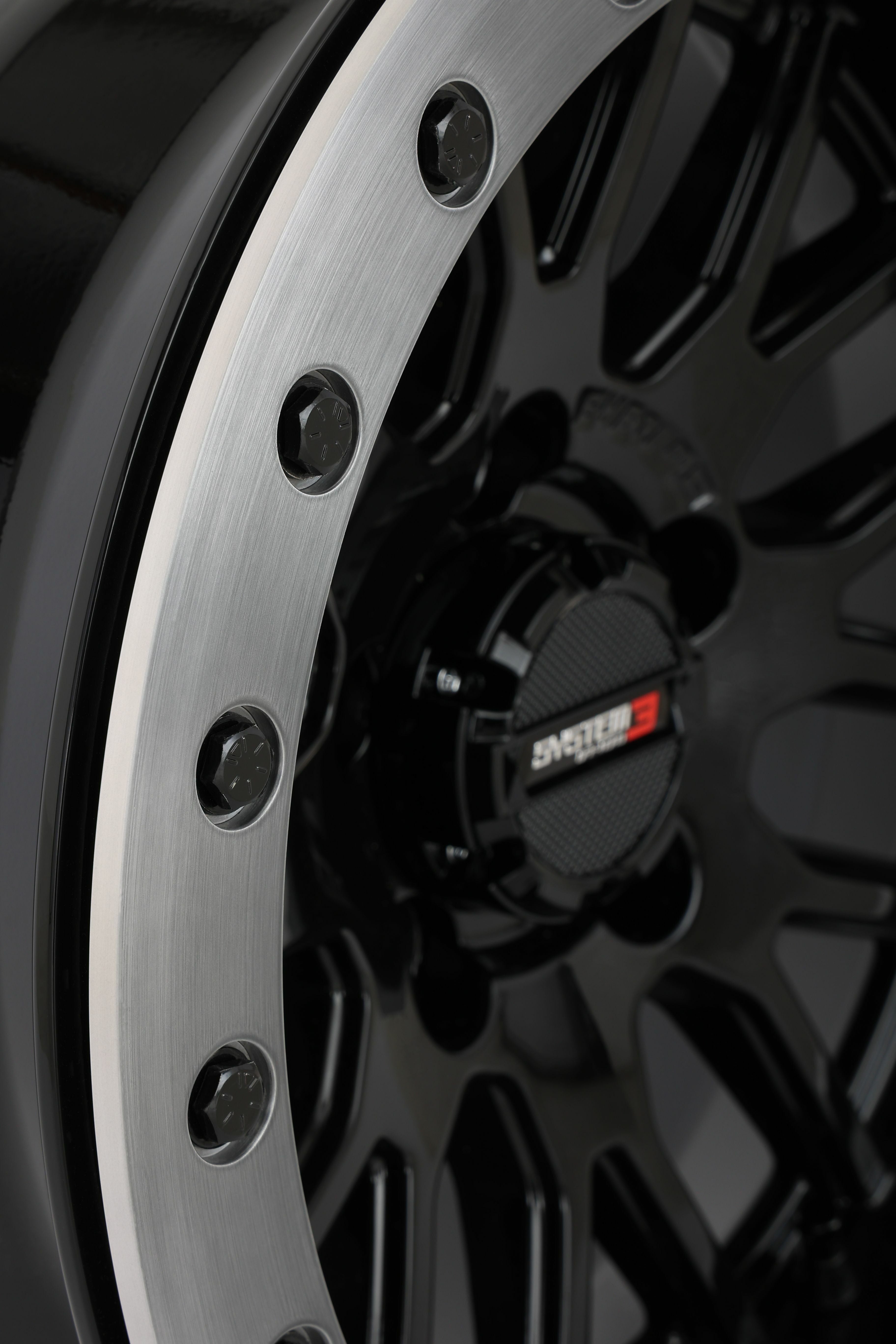 Photo of SB9 WHEEL 15X9 5+4 (+10MM) 5/4.5 GLOSS BLACK by SYSTEM 3 - Premium Wheels for UTVs / Side by Sides