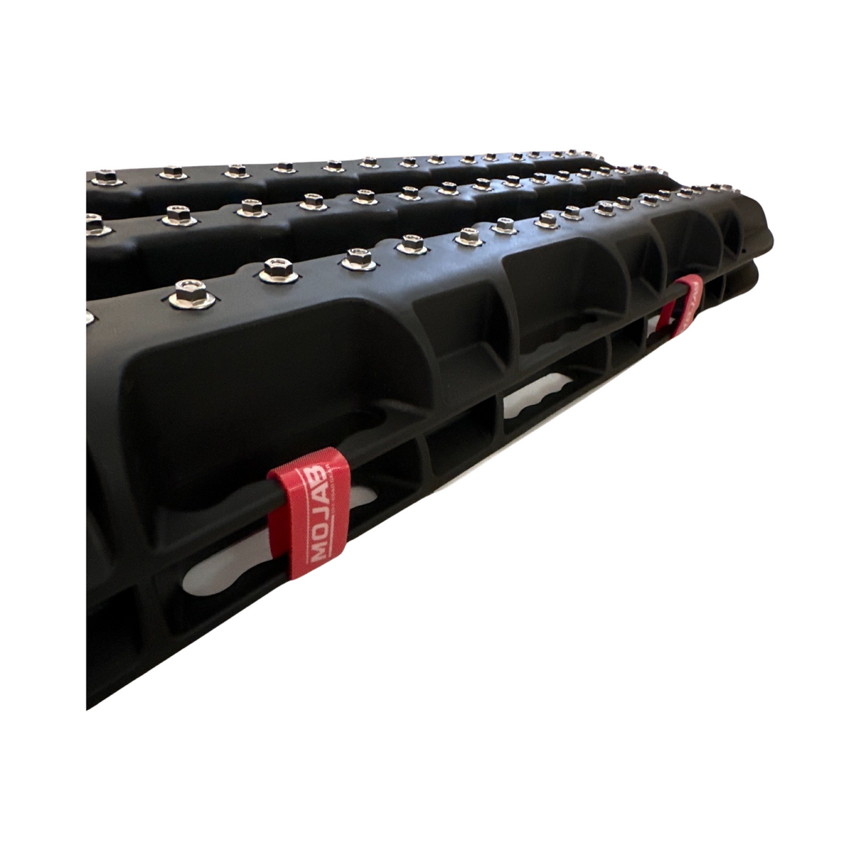 Ultimate Traction recovery board with steel plugs and storage bag.