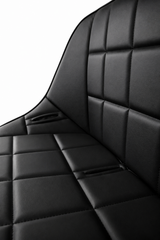 Close-up of the black vinyl 48-inch Baja bench seat and harness opening