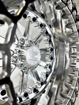 Close-up of a Packard Element silver beadlock UTV wheel with a polished barrel.