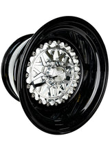 Angled view of a Packard Apollo silver non-beadlock UTV wheel with a black barrel.