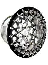 Angled view of a Packard V2 Super Star silver beadlock UTV wheel with a polished barrel.