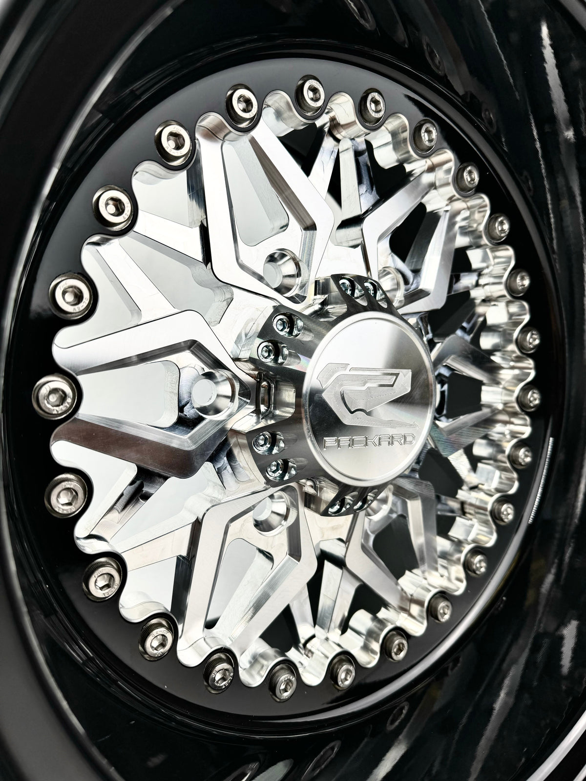 Packard Impact Silver non-beadlock wheel, machined center close-up