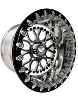 Angled view of a Packard Wishbone gloss black beadlock UTV wheel with a polished barrel.