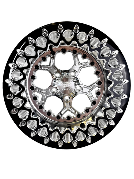 Angled view of a Packard Pro 5 silver beadlock UTV wheel with a polished barrel.