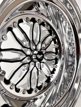 Close-up of a Packard Icon gloss black non-beadlock UTV wheel with a polished barrel.