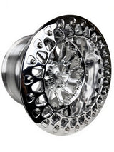 Angled view of a Packard Cyclone silver beadlock UTV wheel with a polished barrel.