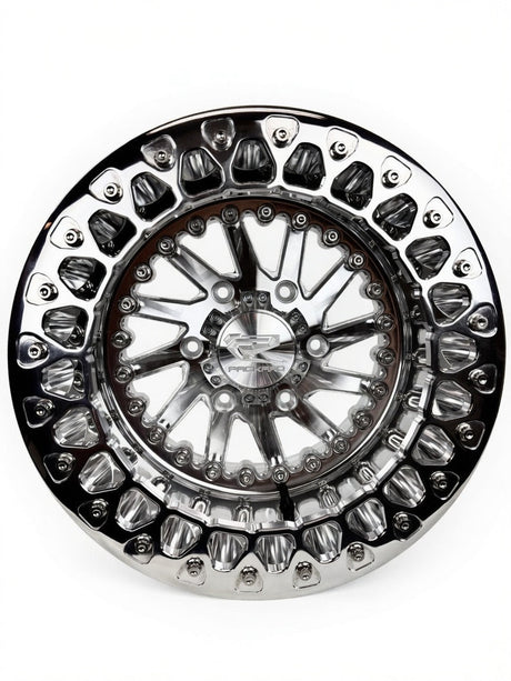 Angled view of a Packard Cyclone silver beadlock UTV wheel with a polished barrel.