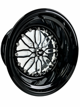 Angled view of a Packard Icon gloss black non-beadlock UTV wheel with a black barrel.