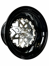 Angled view of a Packard V2 Super Star silver non-beadlock UTV wheel with a black barrel.