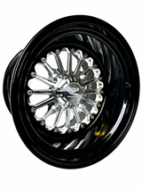Angled view of a Packard Element silver non-beadlock UTV wheel with a black barrel.