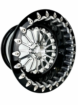 Angled view of a Packard Element silver beadlock UTV wheel with a black barrel.