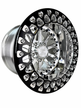 Angled view of a Packard Element silver beadlock UTV wheel with a polished barrel.