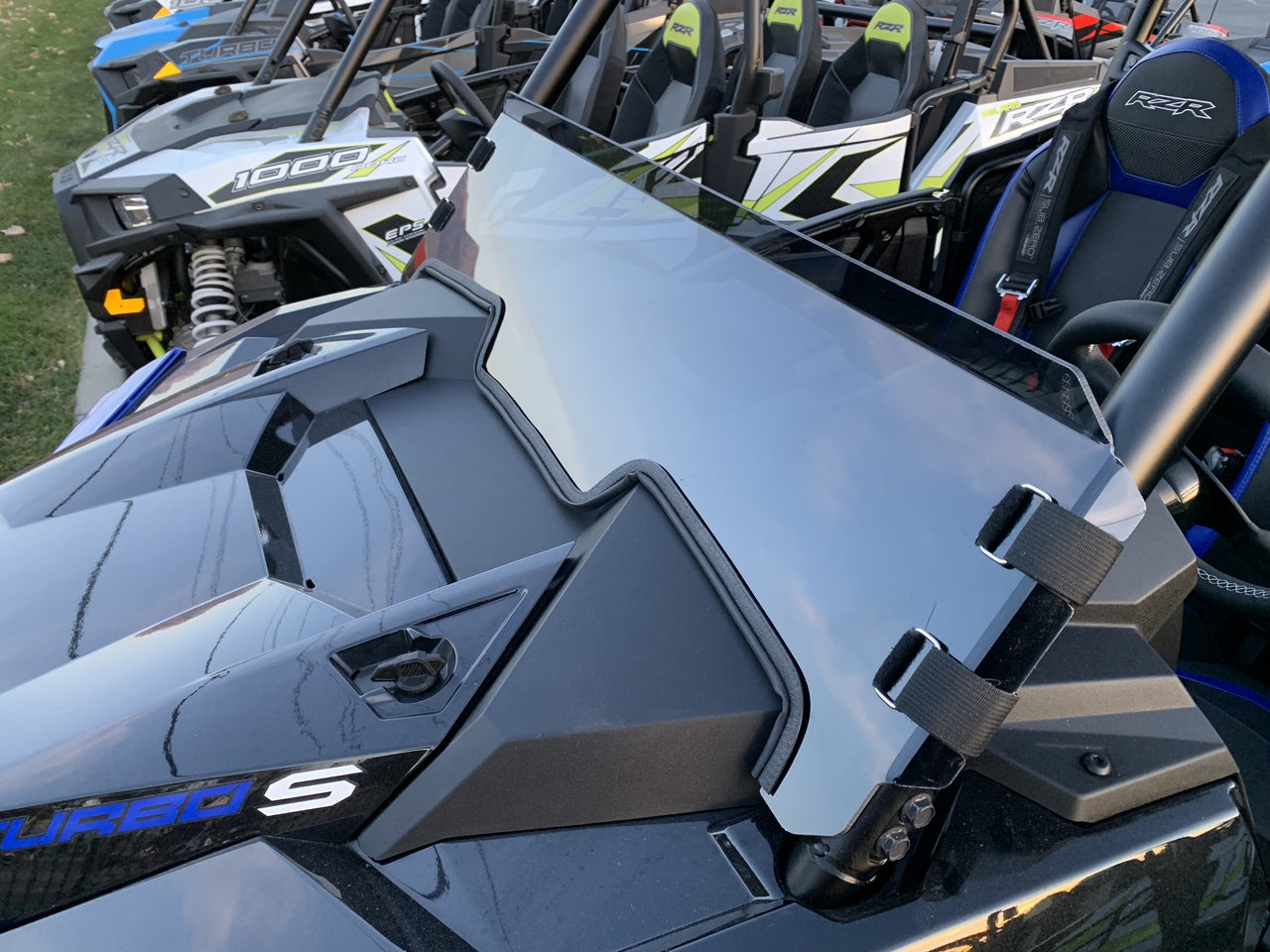 Photo of Polycarbonate Half Windshield with Quick Straps for RZR Turbo S and 2019+ RZR 1000, Turbo by UTVZILLA - Premium for UTVs / Side by Sides