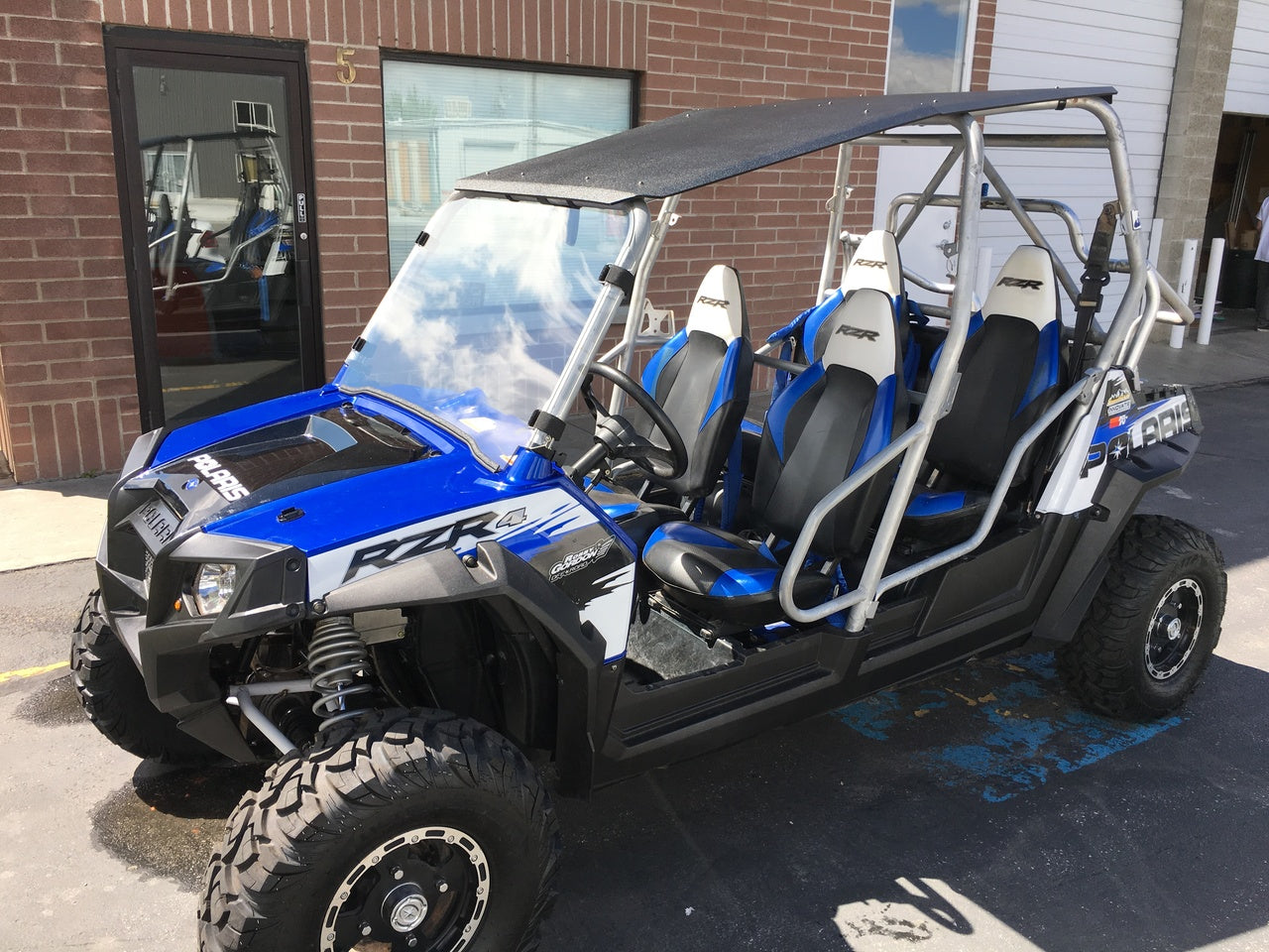 Photo of Full Polycarbonate Windshield with Quick Straps for RZR 570, 800, XP900 (upgrade options) by UTVZILLA - Premium for UTVs / Side by Sides