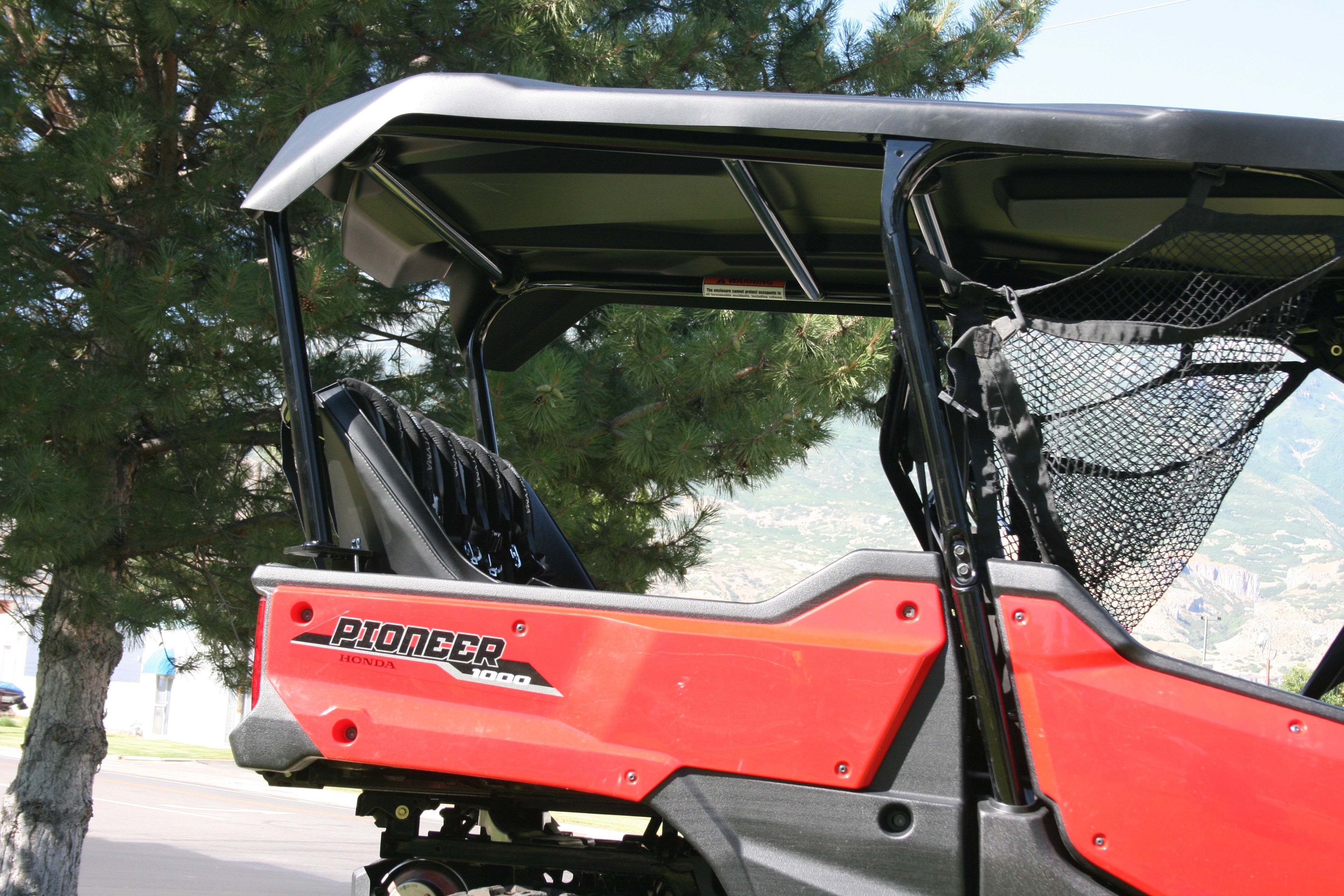 Photo of Honda Pioneer 1000 Back Seat and Roll Cage Kits (2016-2024) by UTV Mountain Accessories - Premium Backseat and Roll Cage for UTVs / Side by Sides