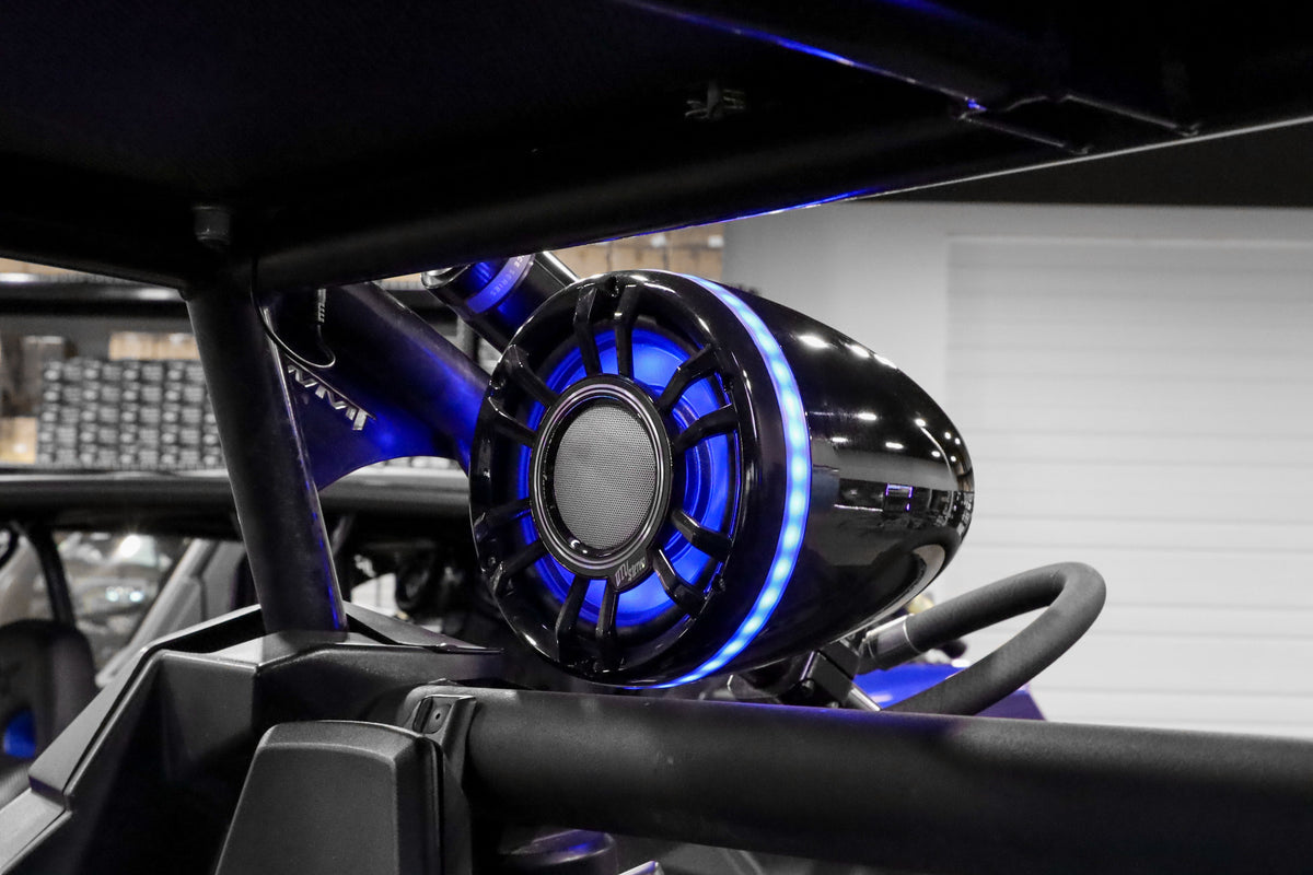 UTV Stereo cage-mounted speakers installed on a Can-Am X3