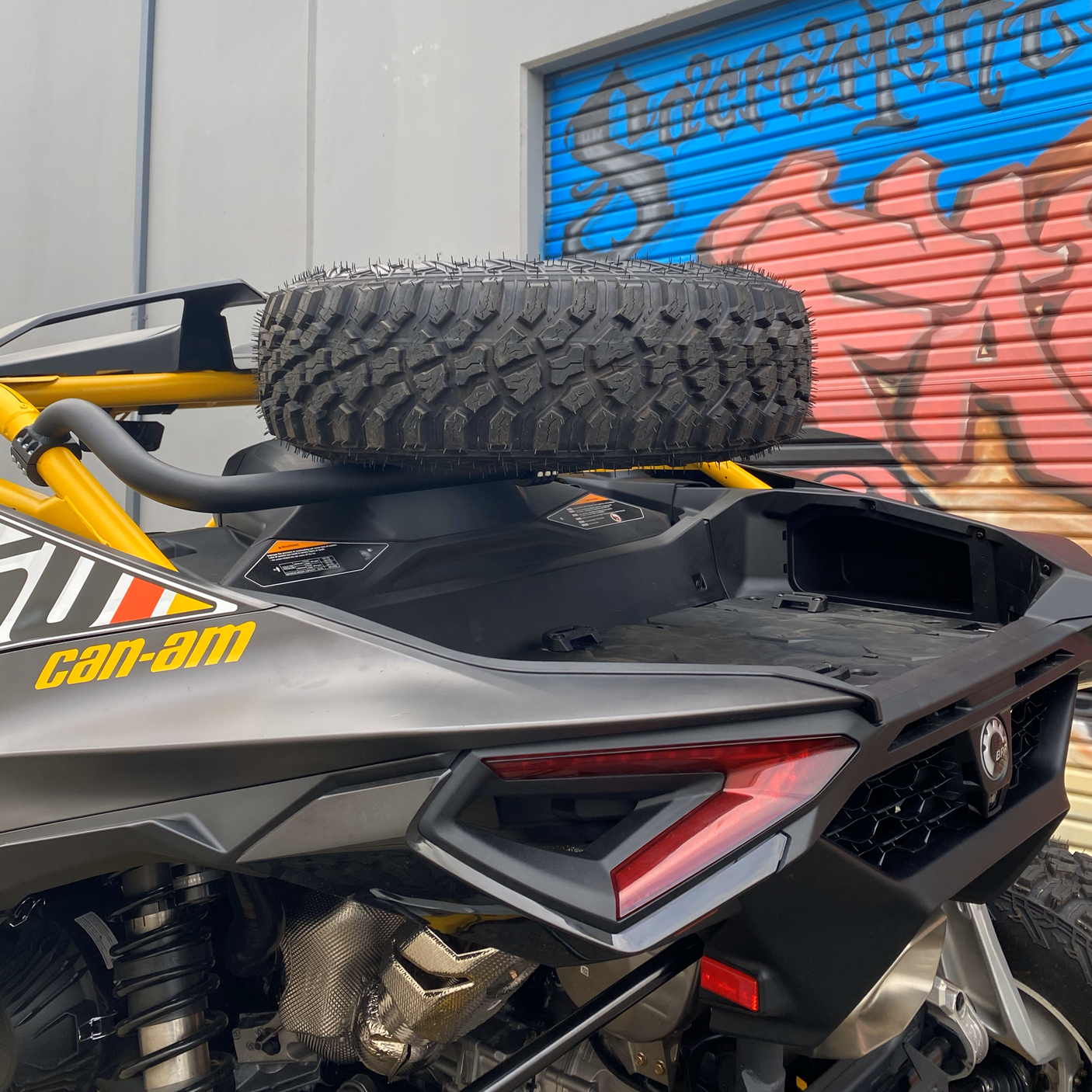 Photo of Can-Am Maverick R Dual Clamp Spare Tire Mount by Factory UTV - Premium Spare Tire Mounts for UTVs / Side by Sides