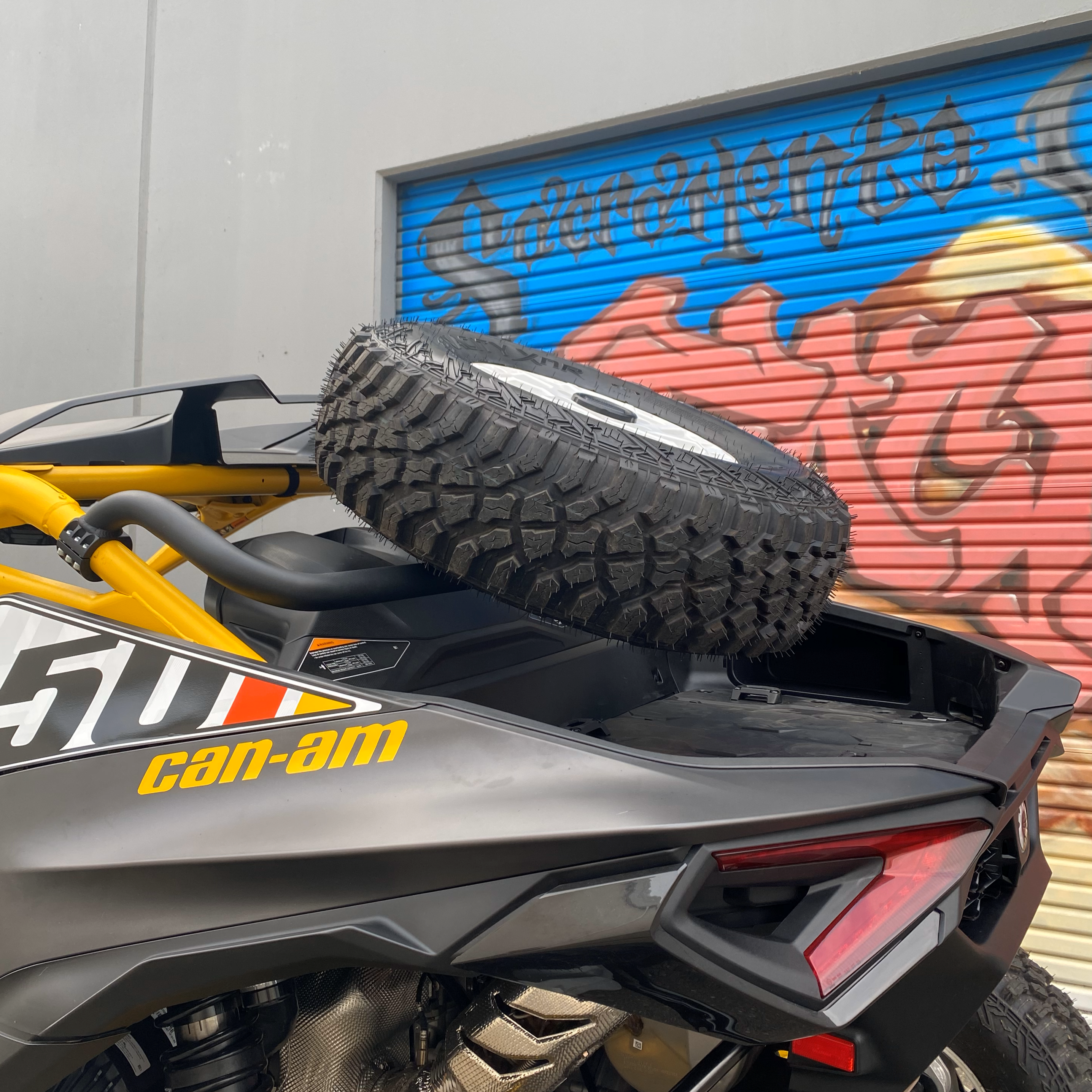 Photo of Can-Am Maverick R Dual Clamp Spare Tire Mount by Factory UTV - Premium Spare Tire Mounts for UTVs / Side by Sides