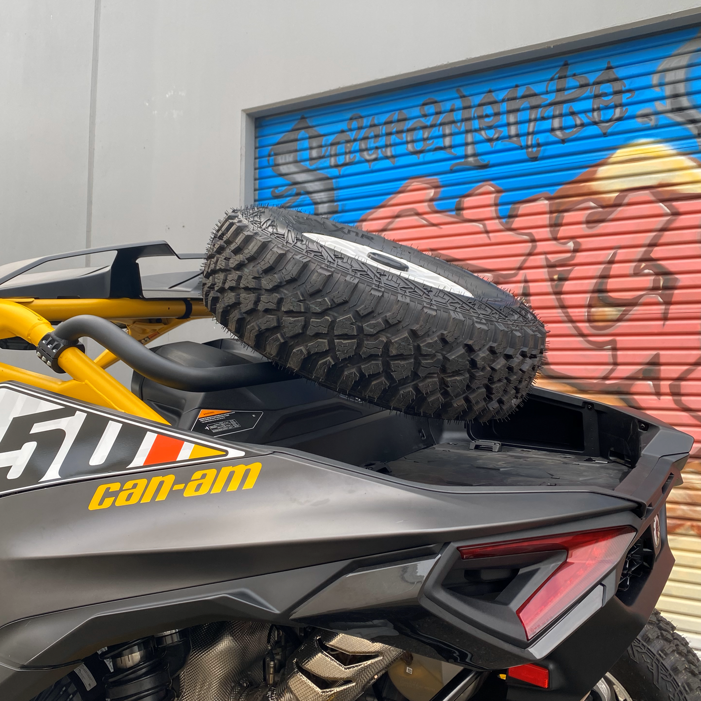 Photo of Can-Am Maverick R Dual Clamp Spare Tire Mount by Factory UTV - Premium Spare Tire Mounts for UTVs / Side by Sides