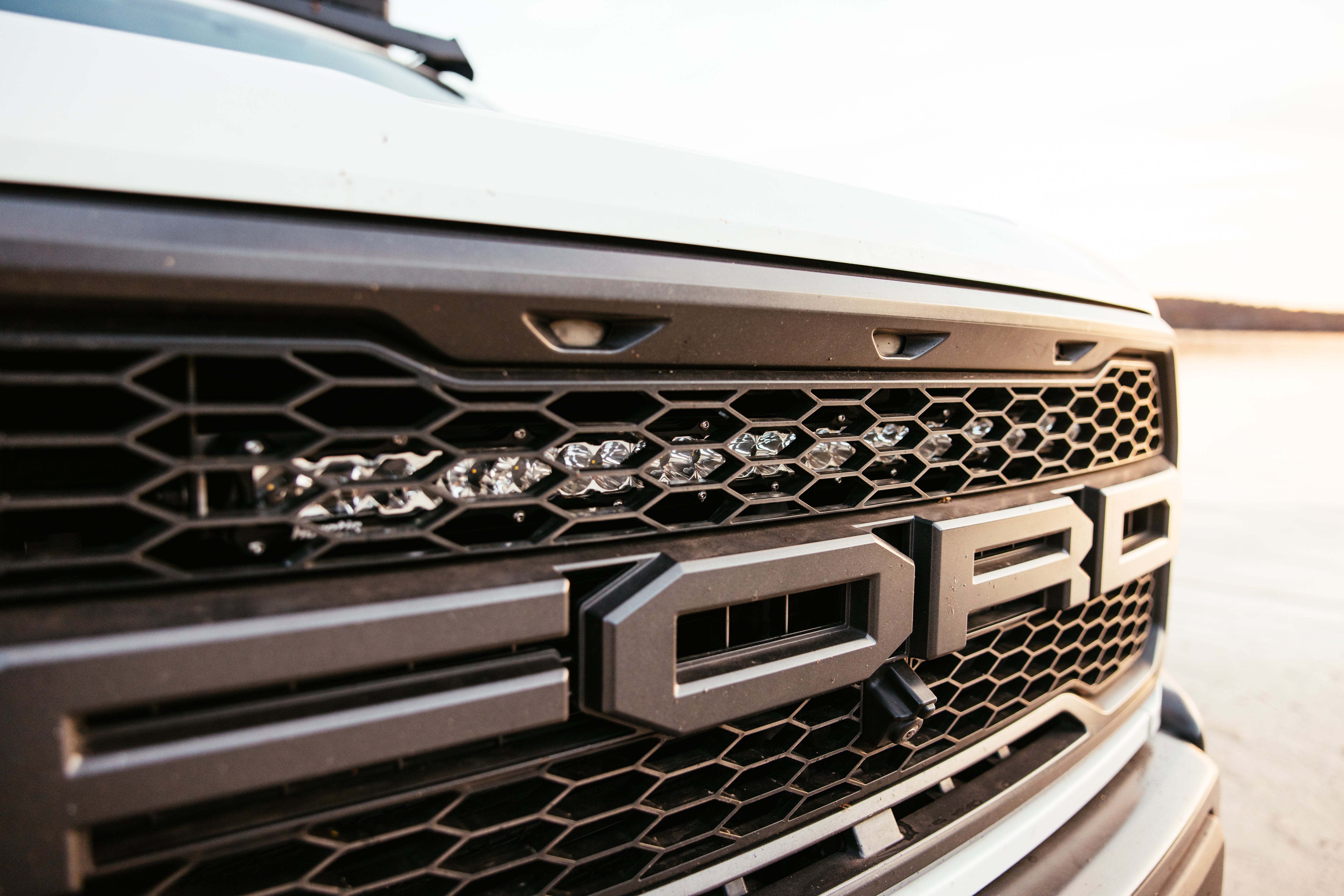 Photo of Ford F150 Raptor (2017-2021) - Behind The Grille 30" LED Light Bar - Clear Lens by Heretic Studio Dealer Portal - Premium for UTVs / Side by Sides