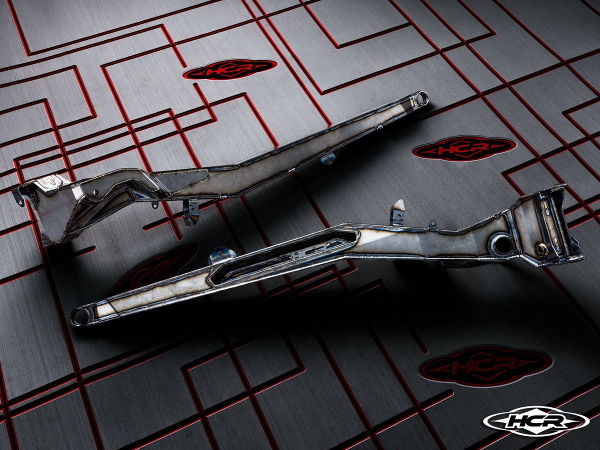 Pair of raw HCR Kawasaki Teryx H2 rear trailing arms