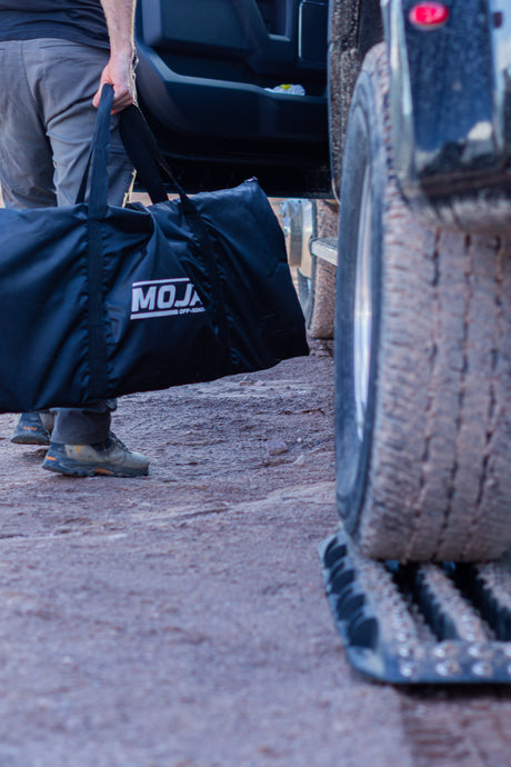 Photo of Ultimate Traction recovery board with steel plugs and storage bag by MOJAB OFFROAD - Premium Recovery board for UTVs / Side by Sides