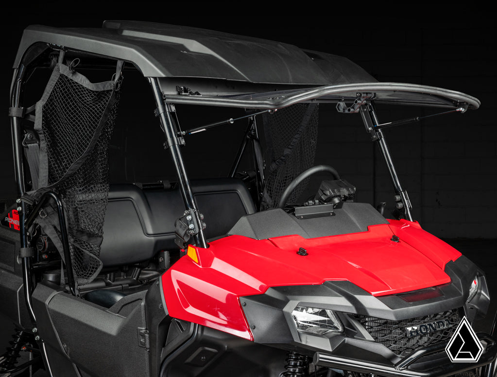 Honda Pioneer 700 Flip Windshield three-quarter view with windshield closed — Assault Industries
