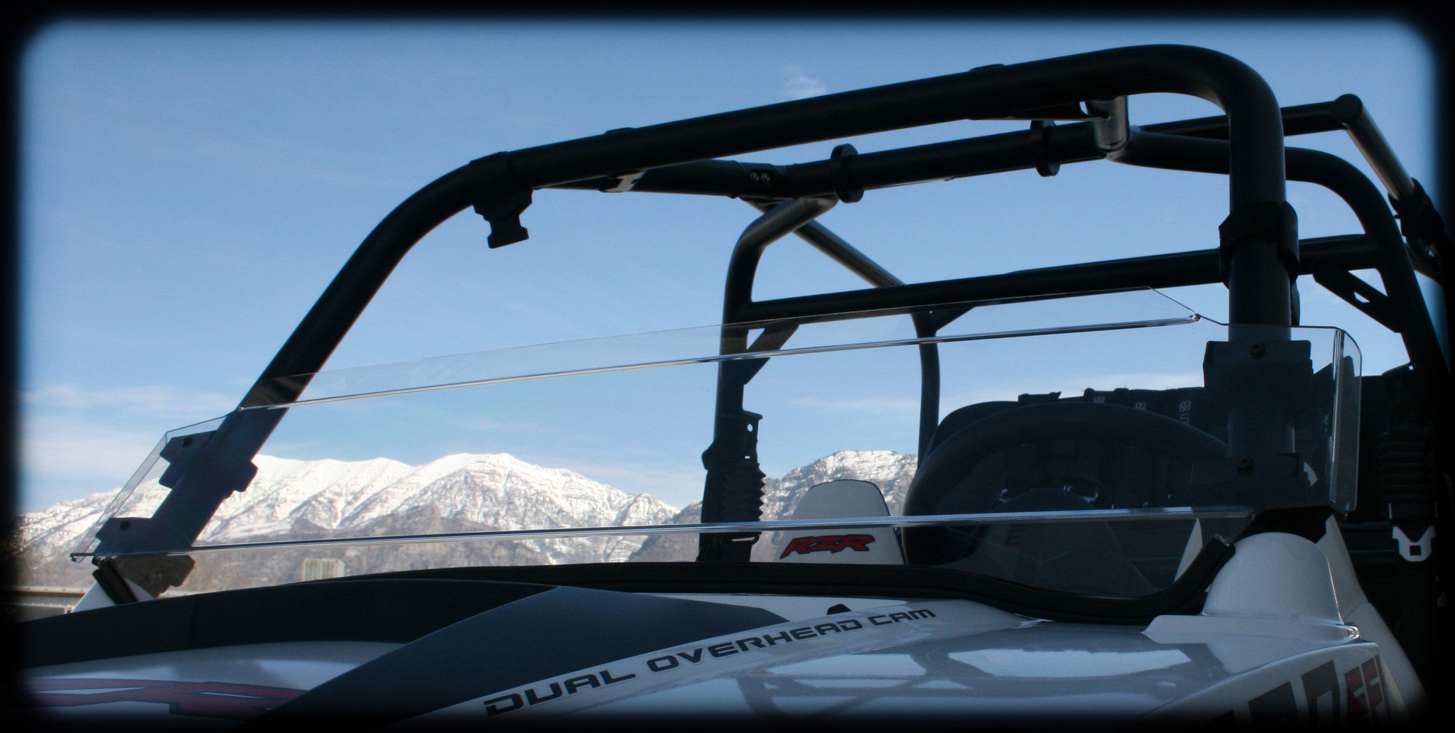 Photo of RZR 570 Half Windshield (2012-2022) by UTV Mountain Accessories - Premium Windshields for UTVs / Side by Sides
