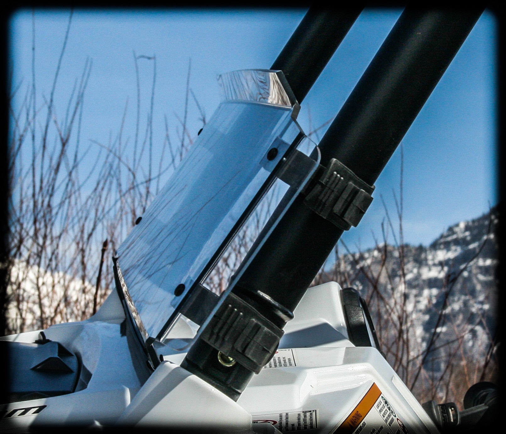 Photo of RZR 570 Half Windshield (2012-2022) by UTV Mountain Accessories - Premium Windshields for UTVs / Side by Sides