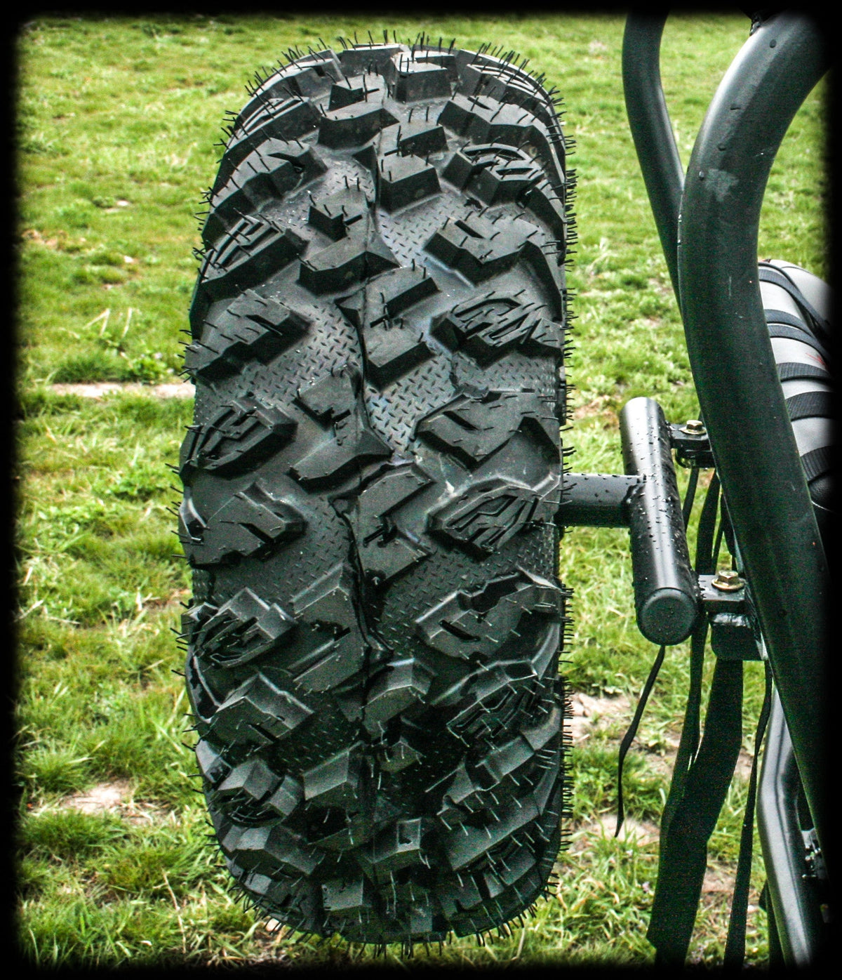 UTV Mountain Accessories spare tire rack mounted on a Polaris RZR